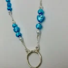 Blue Murano eyeglasses chain with hearts from the Woods & Byrne collection